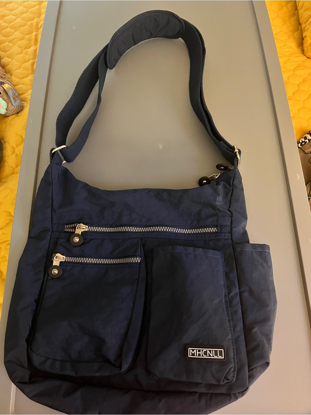 Navy Crossbody Tote with Multiple Zip Pockets
